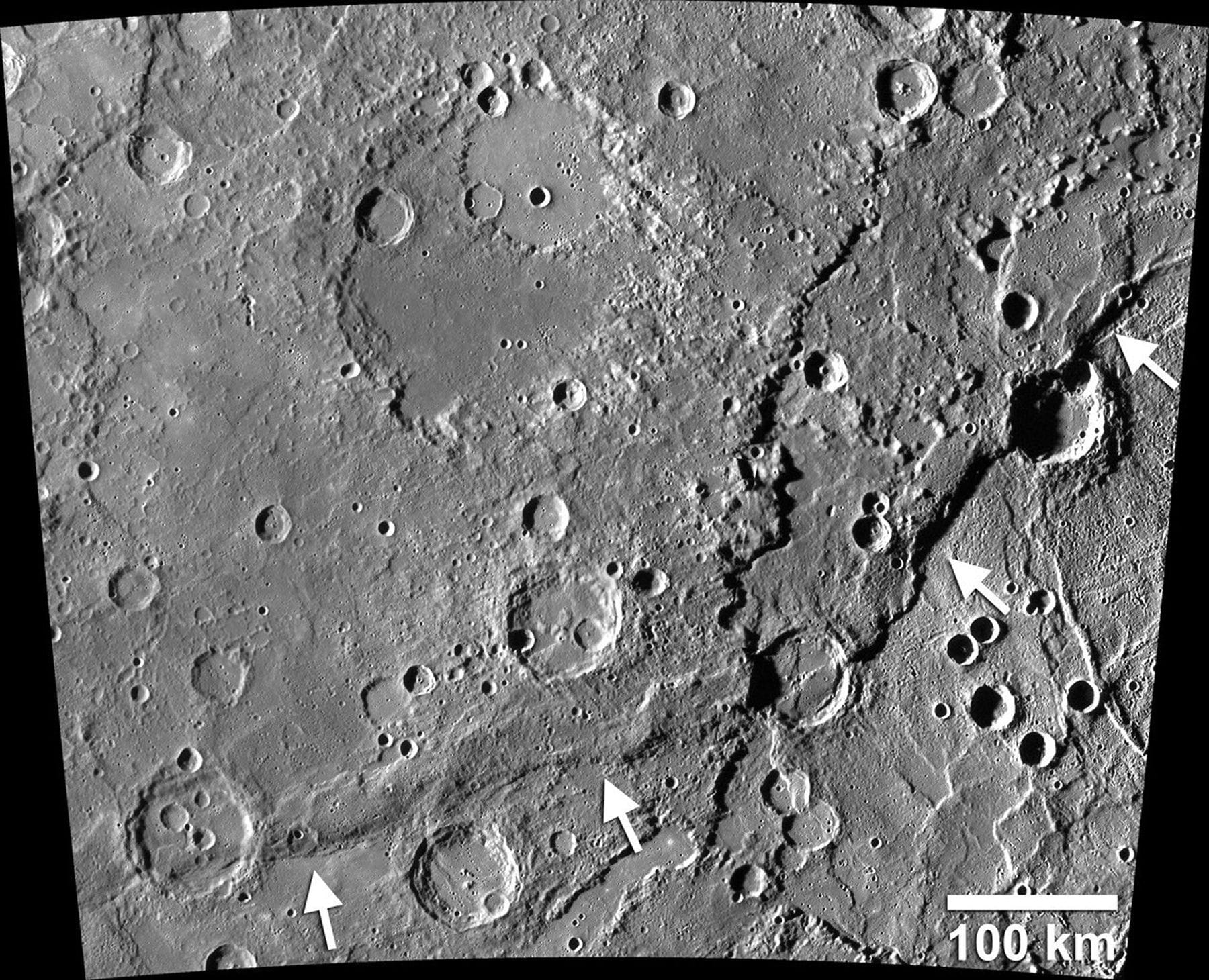 MESSENGER view of Mercury’s Enterprise Rupes scarp with source arrows and a scale bar